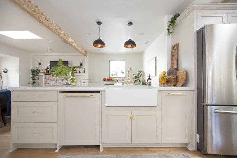 Greige kitchen with Polished Brass